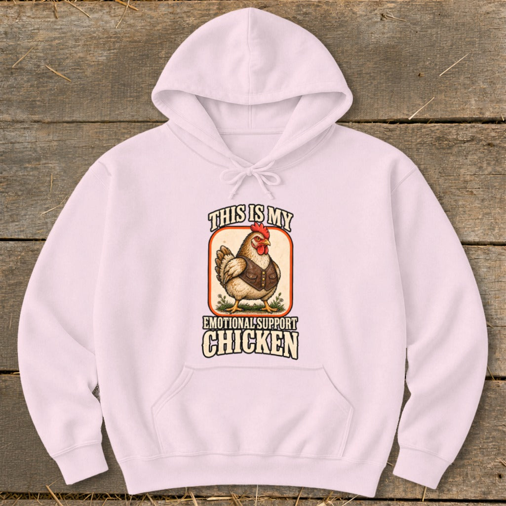 Pink hoodie with a graphic of a chicken wearing a vest and the text "This is my emotional support chicken".