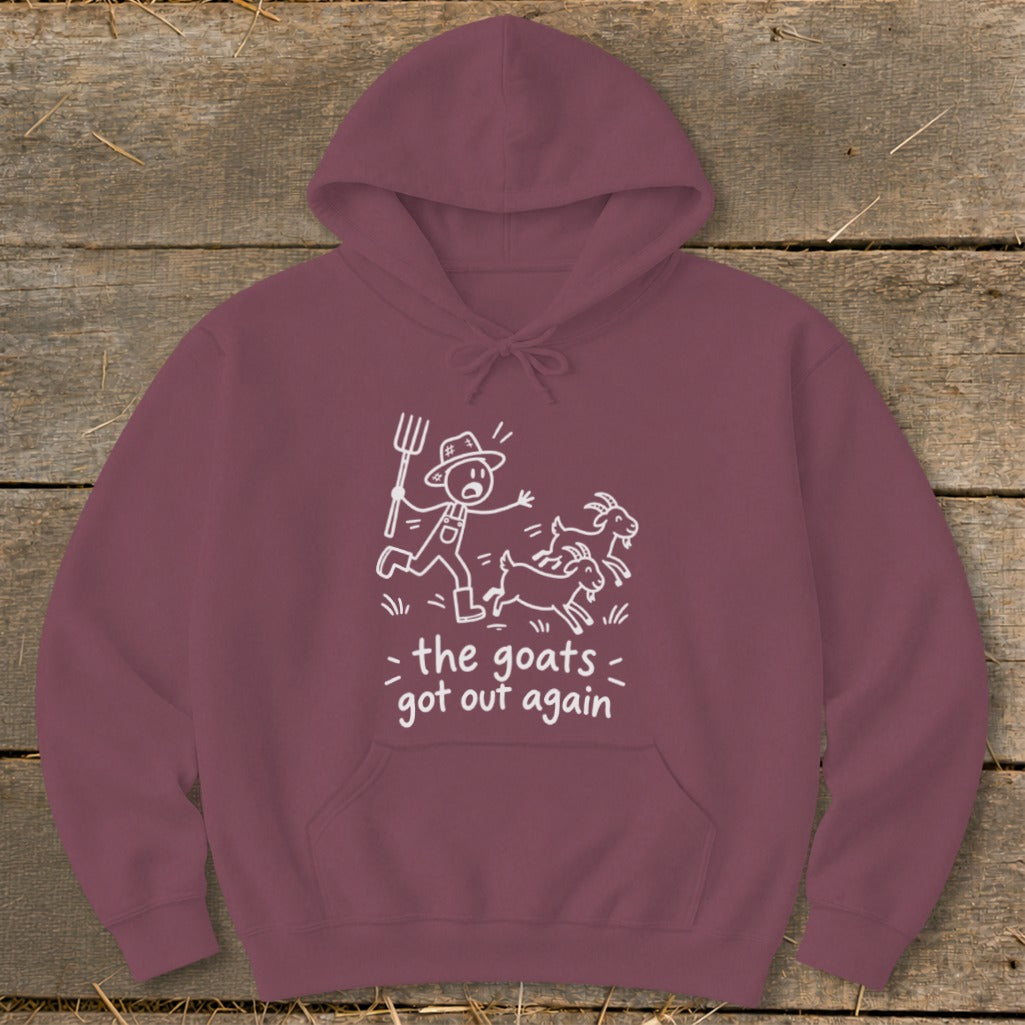 Maroon hoodie with a stick-figure farmer chasing two goats, text reads "the goats got out again".