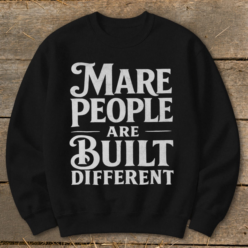 Black sweatshirt with white text reading "Mare People Are Built Different."