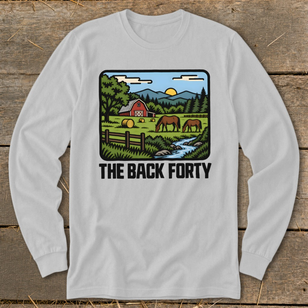 A light gray long-sleeve t-shirt with a rural landscape graphic and the text THE BACK FORTY.