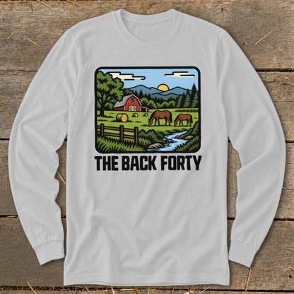 A light gray long-sleeve t-shirt with a rural landscape graphic and the text THE BACK FORTY.