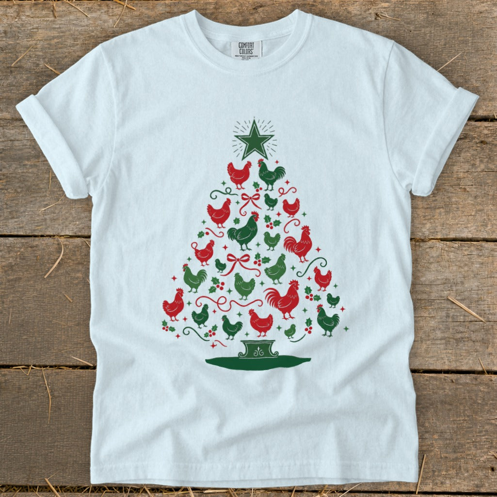 White t-shirt with a Christmas tree made of red and green chickens and holly.
