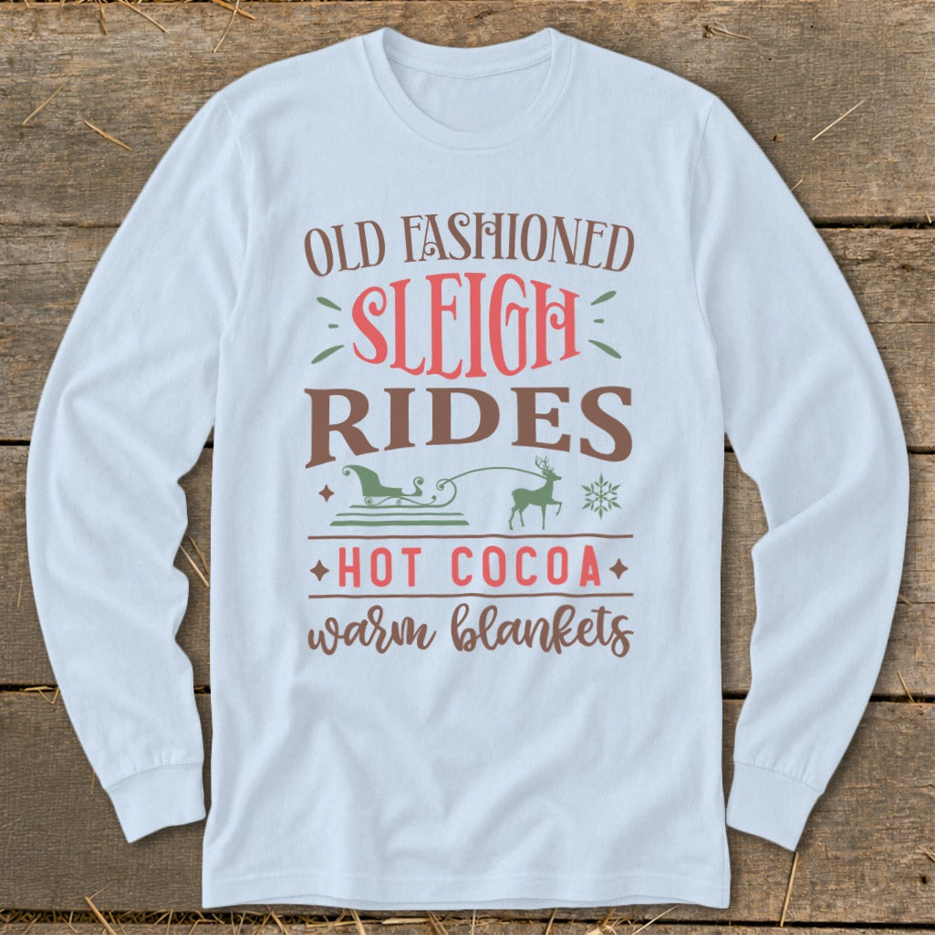 Long sleeve shirt with text Old Fashioned Sleigh Rides Hot Cocoa Warm Blankets.