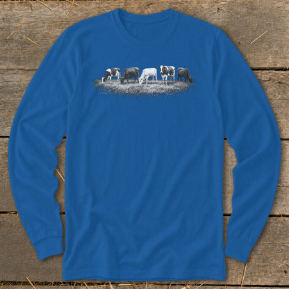 Line of five cows grazing in a field on a blue long-sleeve shirt.