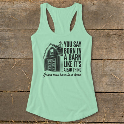 Mint green tank top with barn graphic and text about being born in a barn.