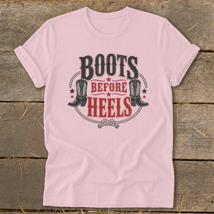 Pink t-shirt with "BOOTS BEFORE HEELS" graphic and cowboy boots.