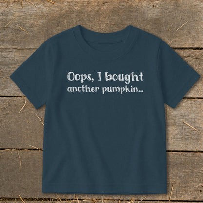 Navy t-shirt with white text that reads "Oops, I bought another pumpkin..."