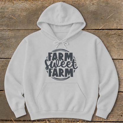 White hoodie with "Farm Sweet Farm" text graphic in a circular design.