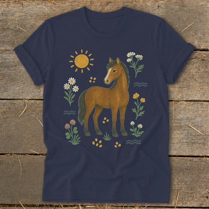 Navy t-shirt with a brown horse surrounded by flowers, sun, and yellow dots.