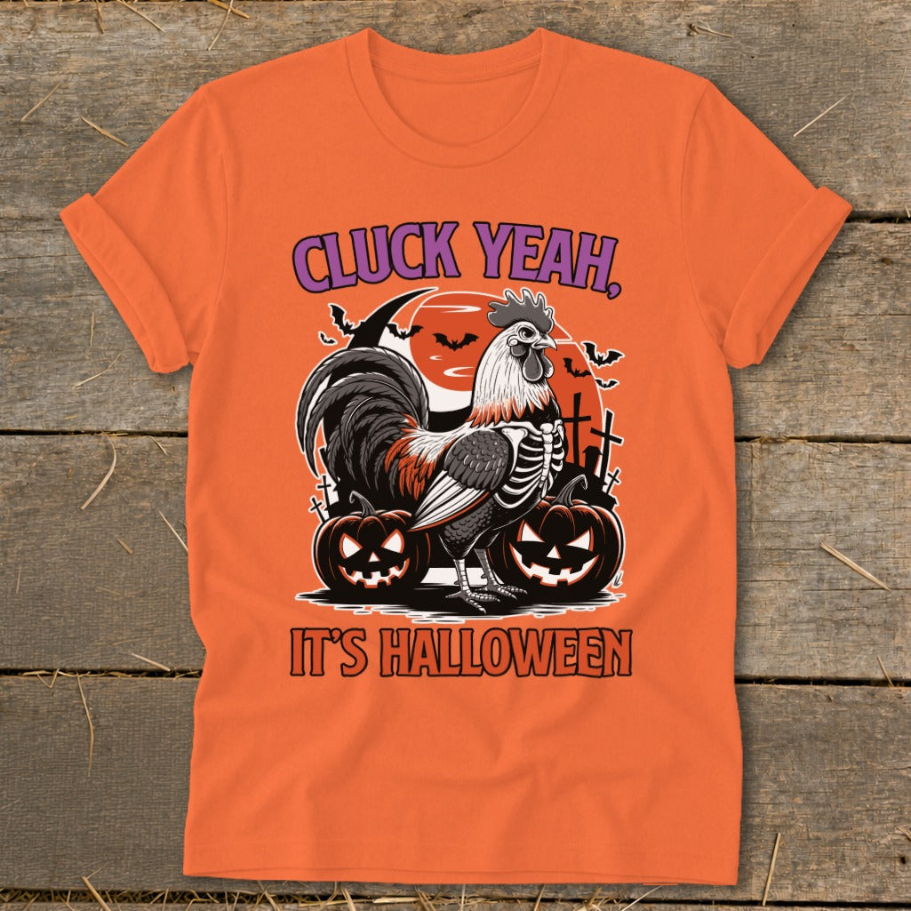 Orange t-shirt with skeleton rooster, pumpkins, and Halloween text.
