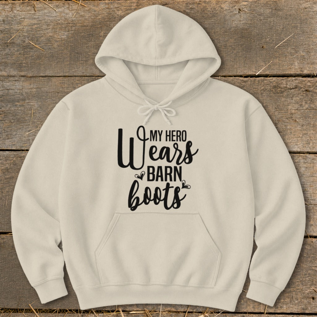 Beige hoodie with "My Hero Wears Barn Boots" text and small heart accents.
