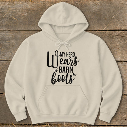 Beige hoodie with "My Hero Wears Barn Boots" text and small heart accents.