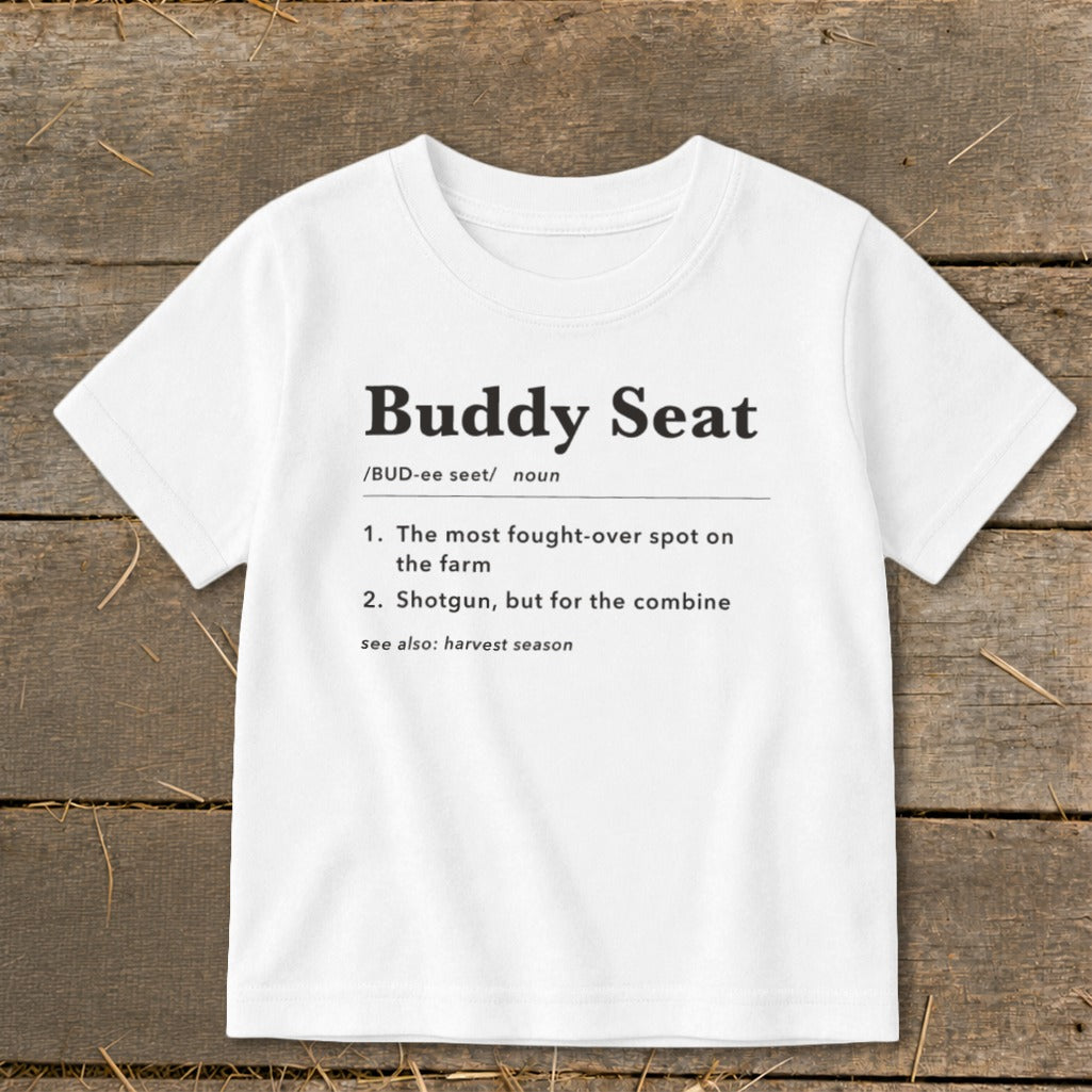 White t-shirt with "Buddy Seat" definition: "The most fought-over spot on the farm" or "Shotgun, but for the combine."