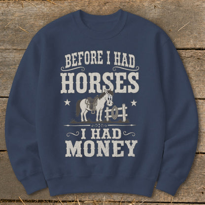 Dark blue sweatshirt with text "Before I had horses, I had money" and cartoon horse graphic.