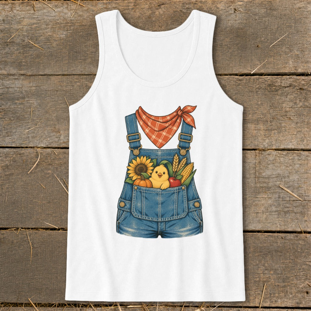 White tank top with denim overalls graphic filled with fall harvest items and a chick.