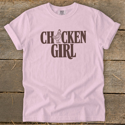 Pink t-shirt with "CHICKEN GIRL" text and a chicken graphic.