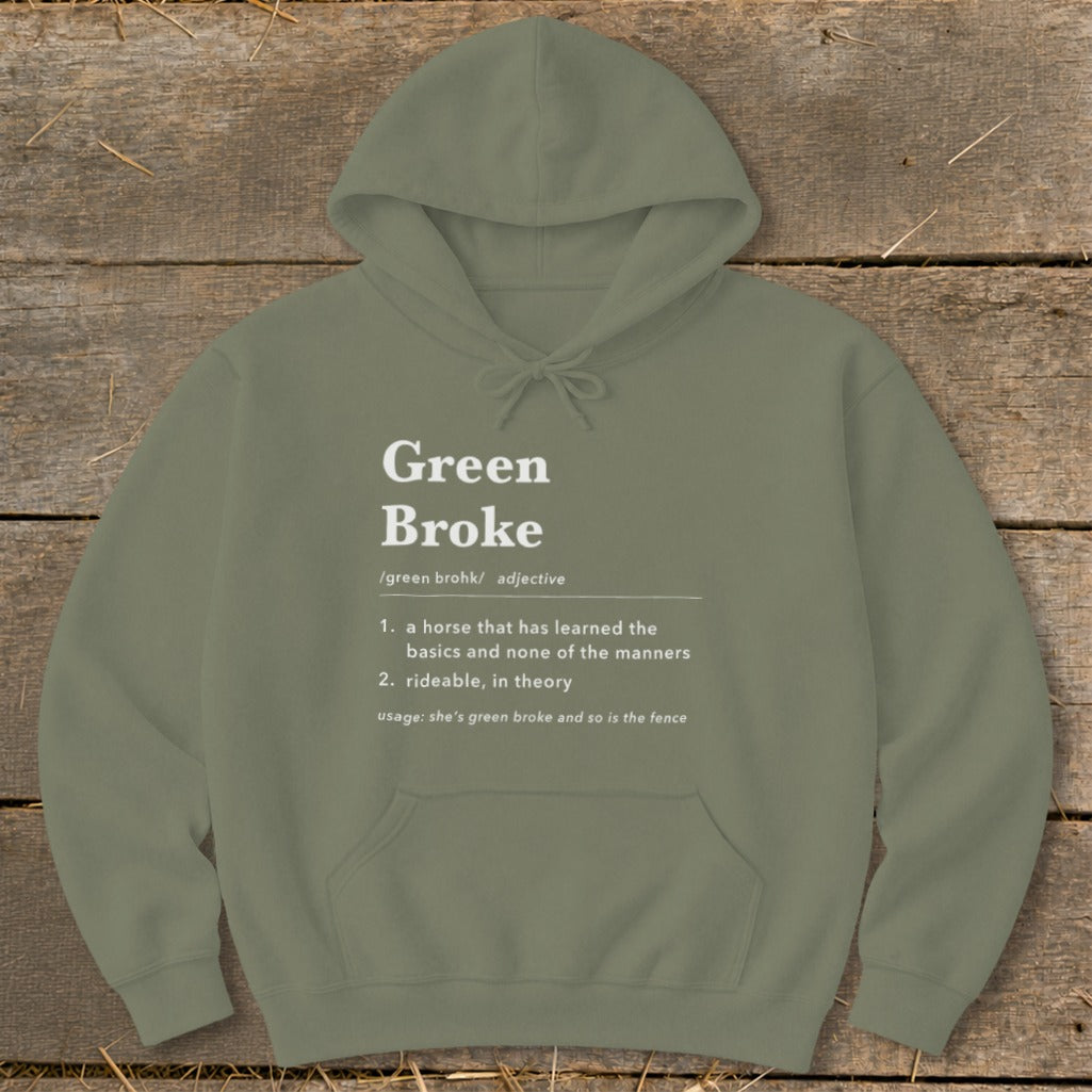 An olive green hooded sweatshirt with white text defining Green Broke in dictionary format.