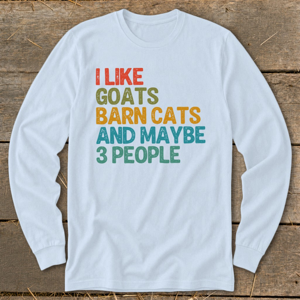 White long-sleeve shirt with text "I LIKE GOATS BARN CATS AND MAYBE 3 PEOPLE".