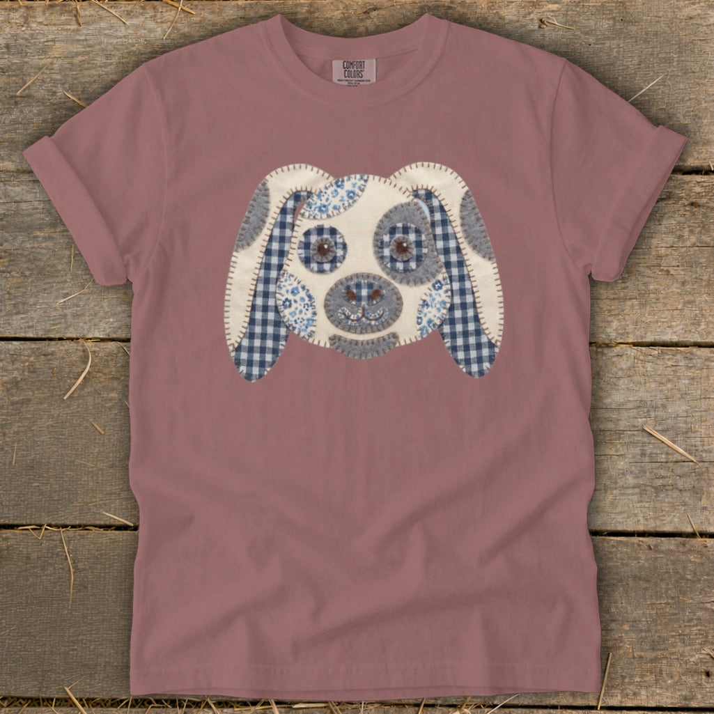 Pink t-shirt with a patchwork dog face applique.