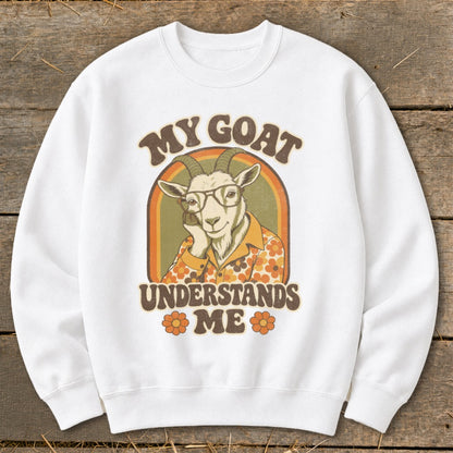 White sweatshirt with retro graphic of a goat wearing glasses and shirt, text "MY GOAT UNDERSTANDS ME".