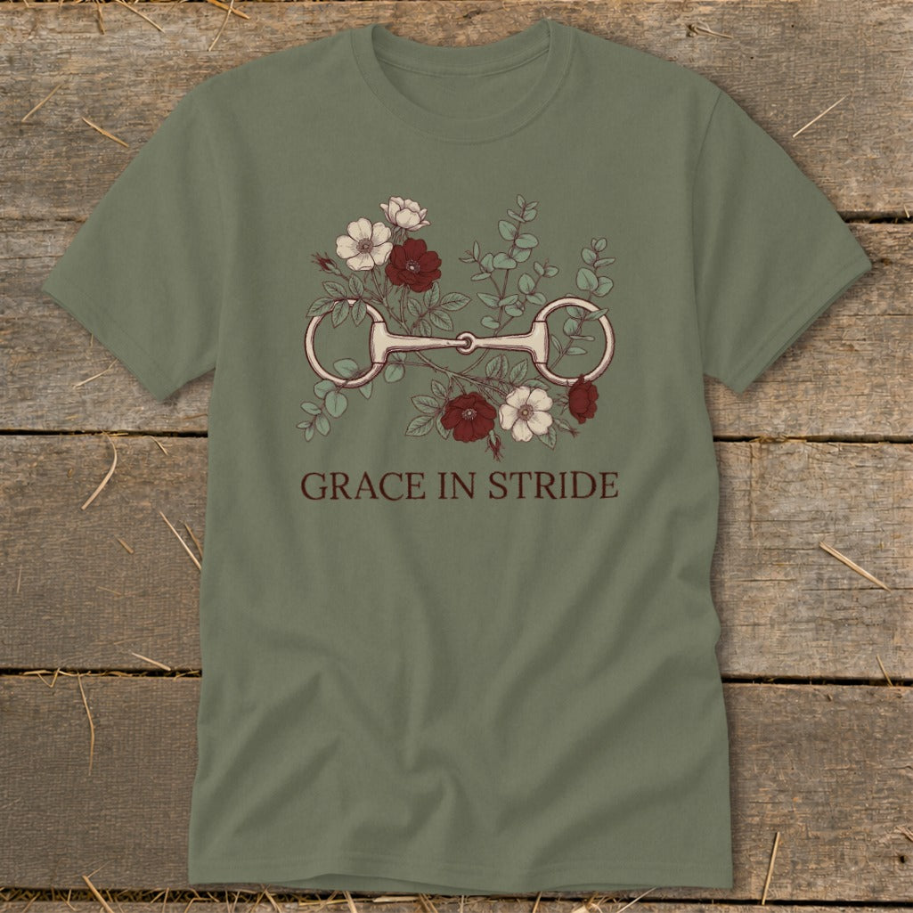 Olive green t-shirt with horse bit and flowers design, "GRACE IN STRIDE" text.