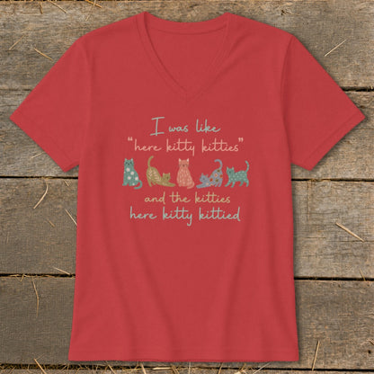 Red v-neck shirt with "I was like 'here kitty kitties' and the kitties here kitty kittied" and kittens.