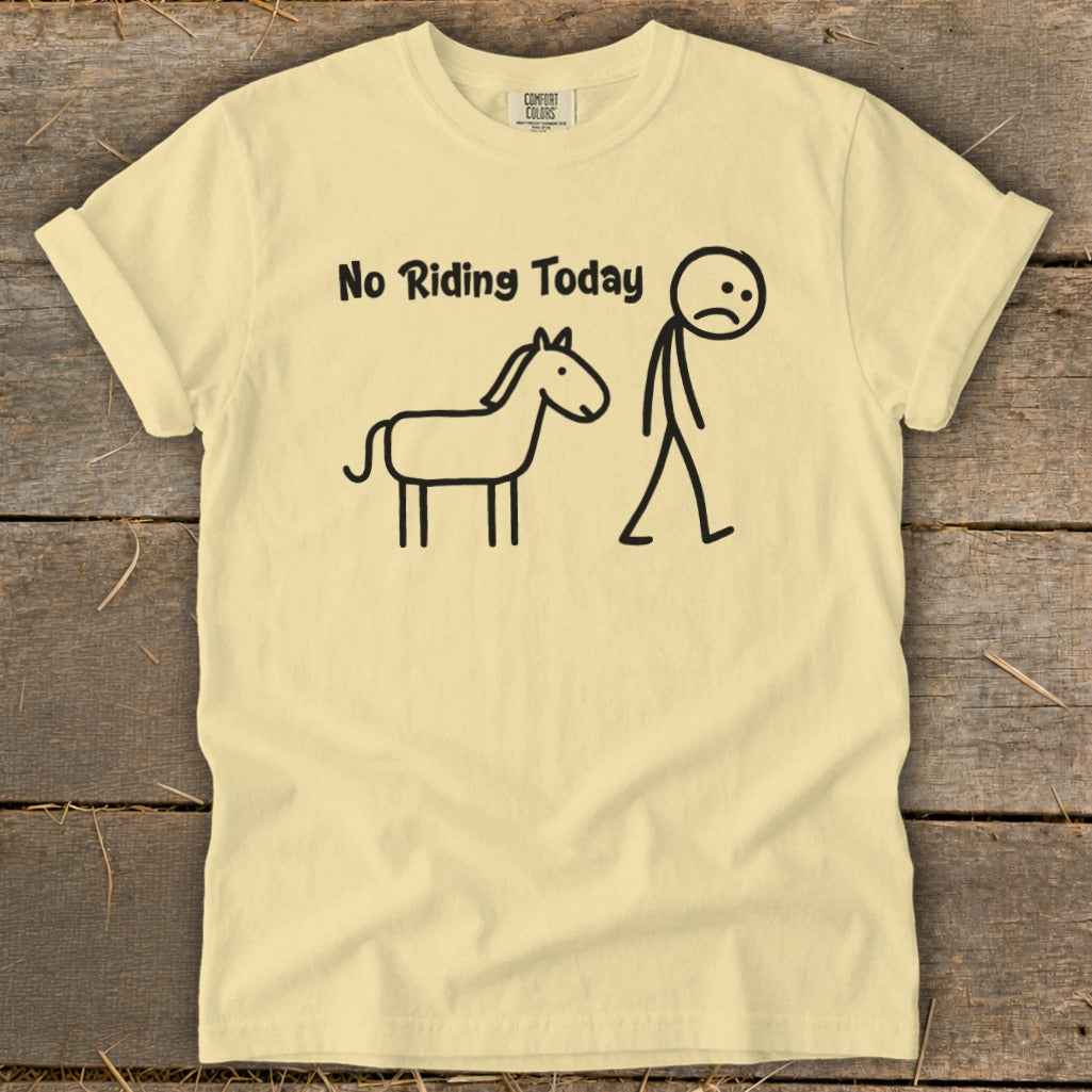 Yellow t-shirt with black text "No Riding Today" and a drawing of a sad stick figure and a horse.