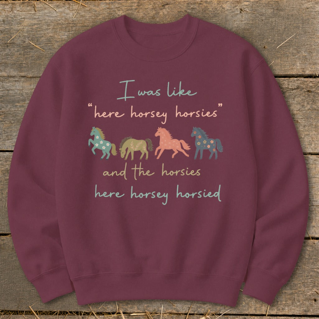 Maroon sweatshirt with text "I was like 'here horsey horsies' and the horsies here horsey horsied."