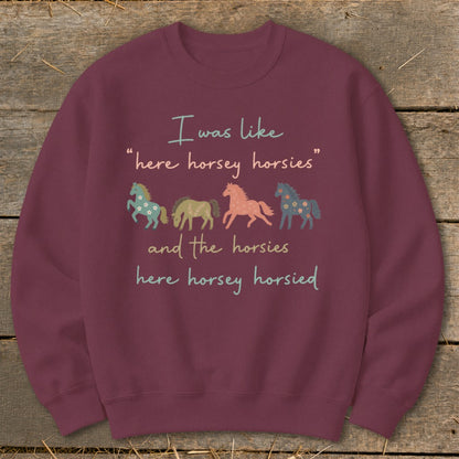 Maroon sweatshirt with text "I was like 'here horsey horsies' and the horsies here horsey horsied."
