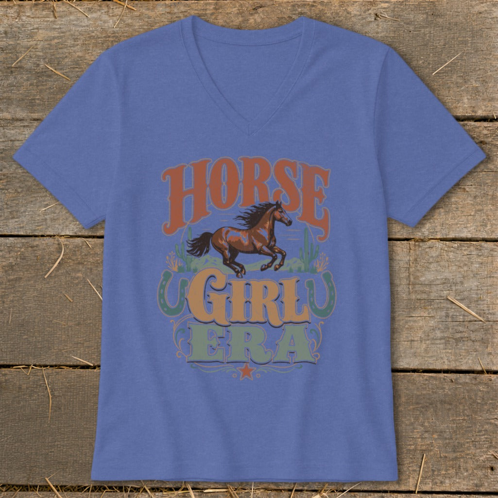 Blue v-neck t-shirt with "Horse Girl Era" text and a running horse graphic.