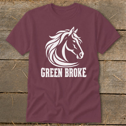 A maroon crewneck t-shirt featuring a white horse head graphic and the text GREEN BROKE.
