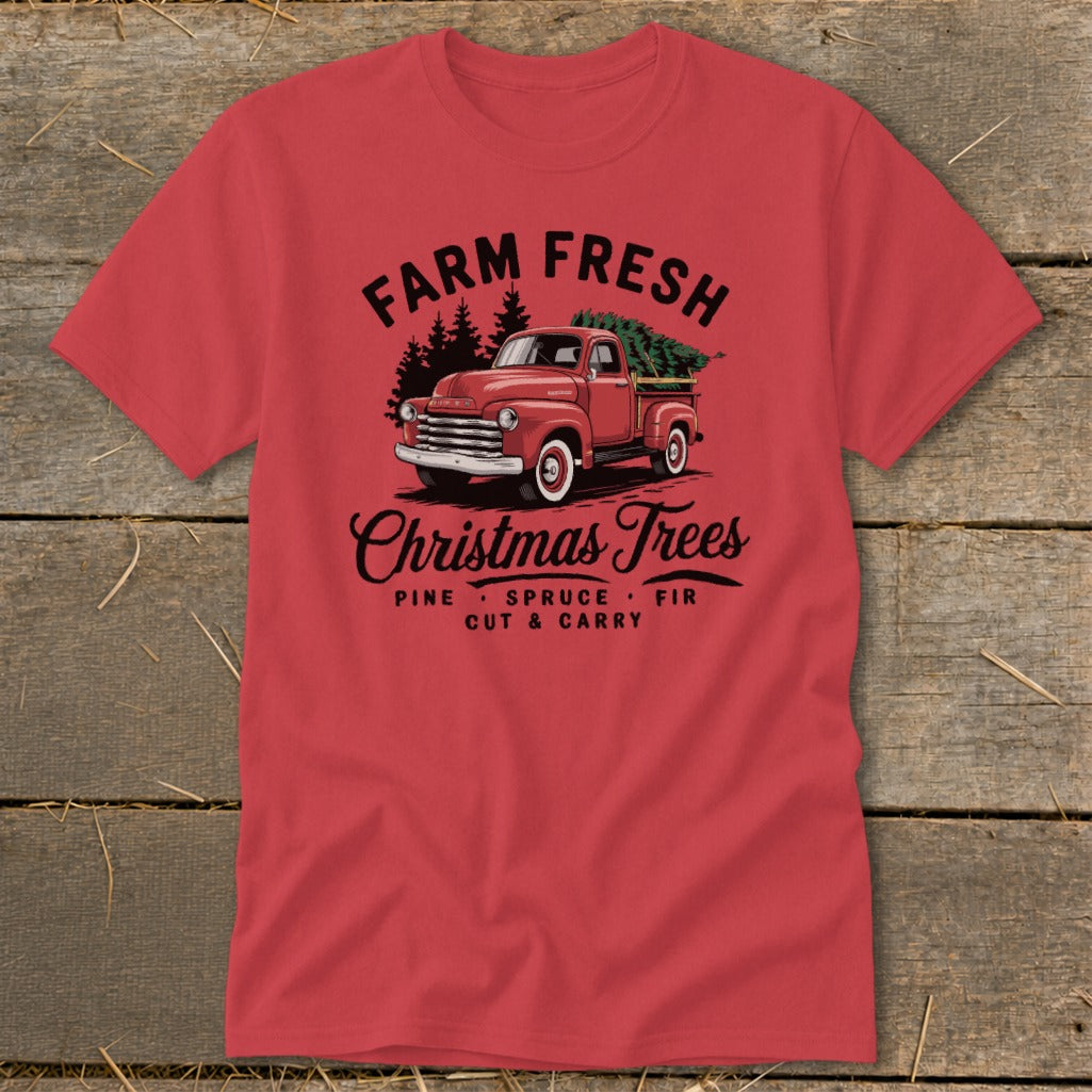 Red t-shirt with "Farm Fresh Christmas Trees" graphic featuring a vintage truck.