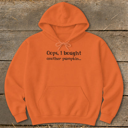 Orange hoodie with "Oops, I bought another pumpkin..." text.