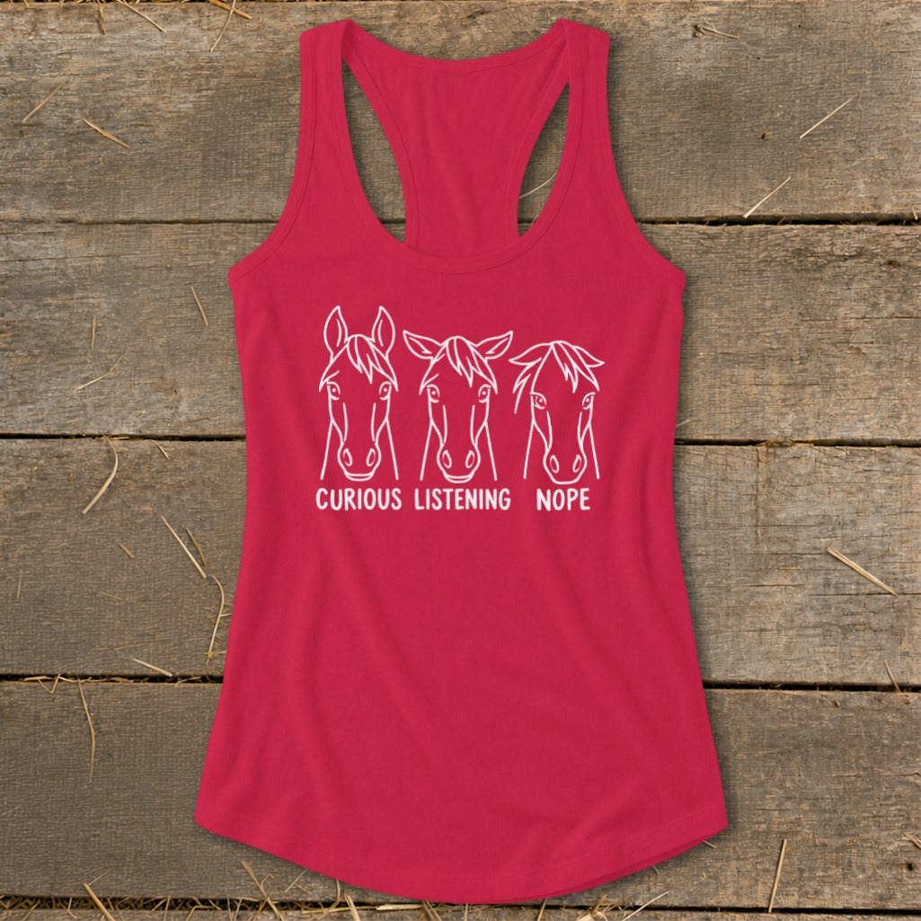 Red racerback tank top with a white graphic of three horse heads labeled Curious, Listening, and Nope.