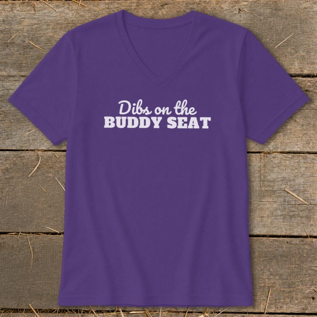 Purple V-neck t-shirt with "Dibs on the BUDDY SEAT" text.