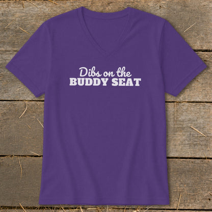 Purple V-neck t-shirt with "Dibs on the BUDDY SEAT" text.