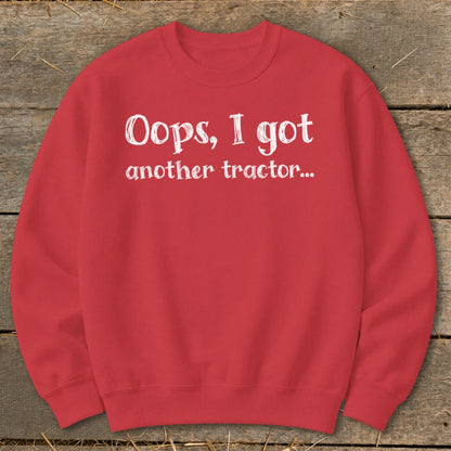 Red sweatshirt with white text that reads "Oops, I got another tractor..."