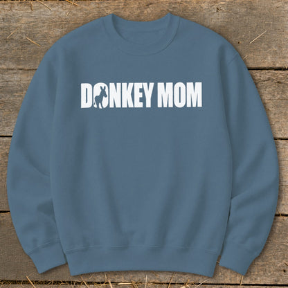 A blue crewneck sweatshirt with the white text "DONKEY MOM" and a donkey silhouette.