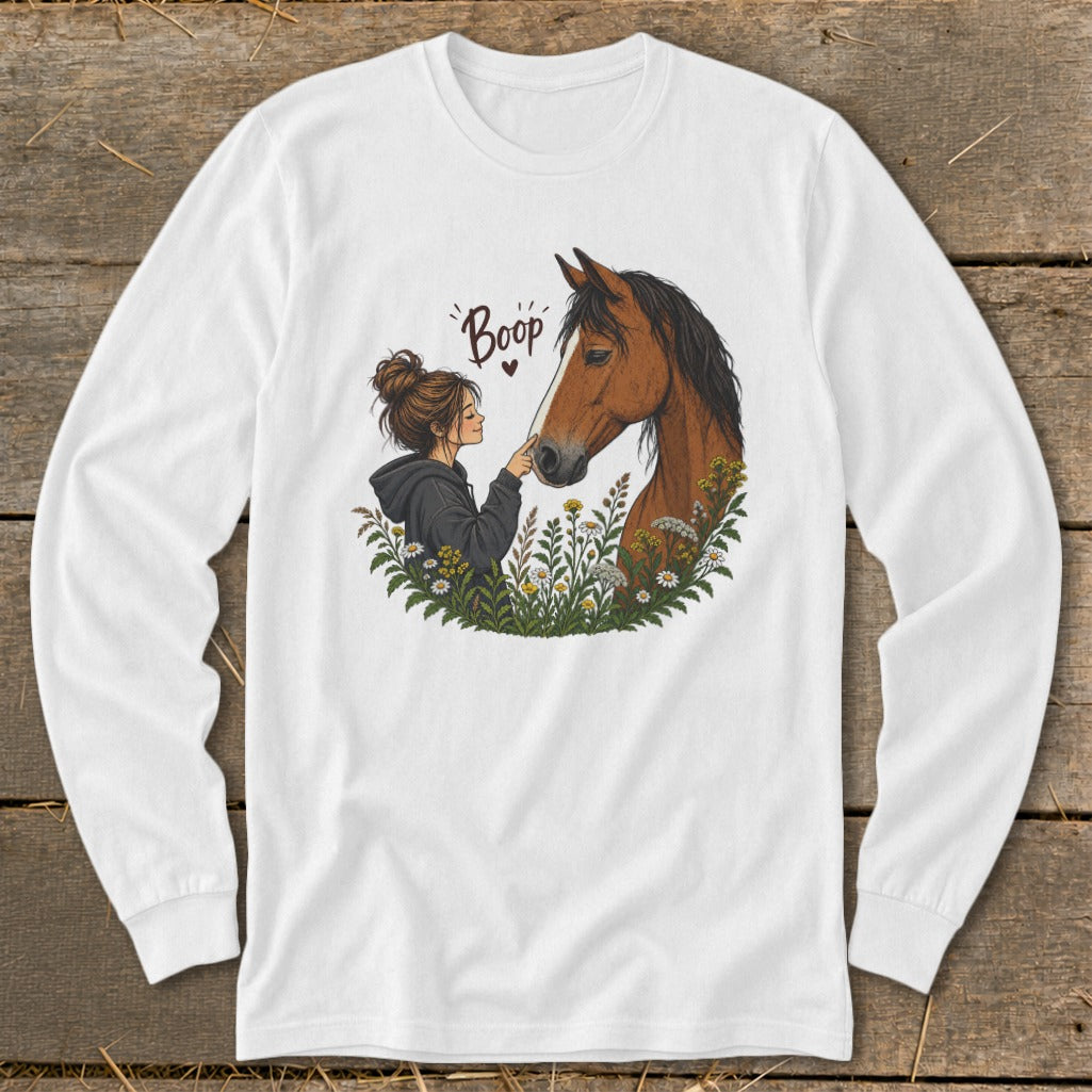 Illustration of a girl touching a horse's nose with the word "Boop" above.