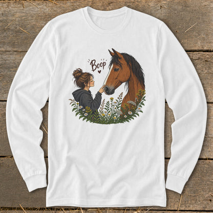 Illustration of a girl touching a horse's nose with the word "Boop" above.