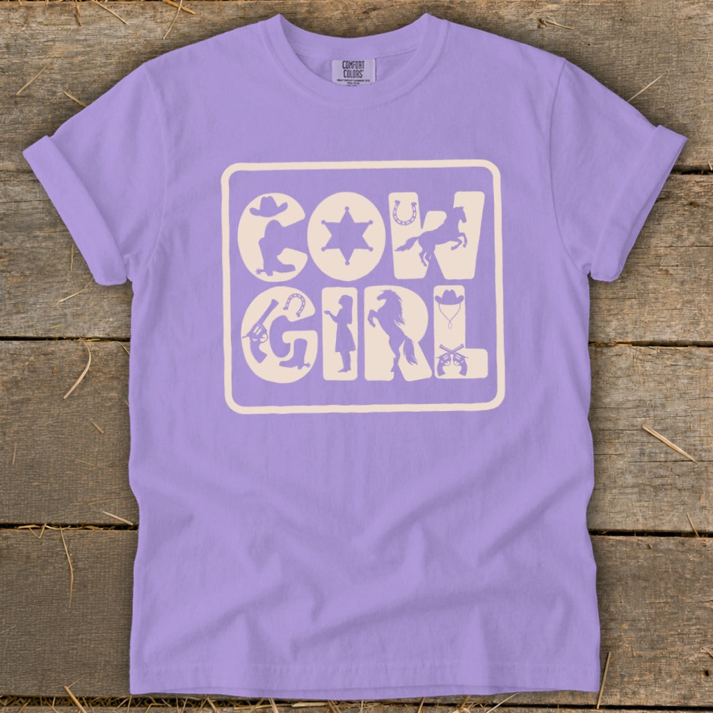 Purple t-shirt with "COWGIRL" text and cowboy-themed silhouettes.