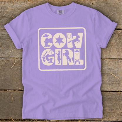 Purple t-shirt with "COWGIRL" text and cowboy-themed silhouettes.