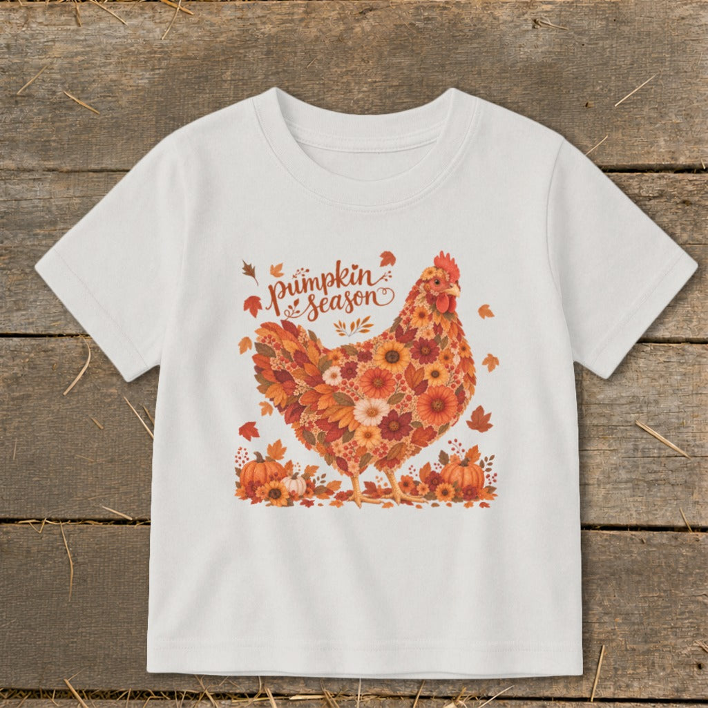 White t-shirt with "Pumpkin Season" text and a chicken made of leaves and flowers.