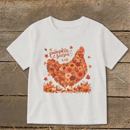 White t-shirt with "Pumpkin Season" text and a chicken made of leaves and flowers.
