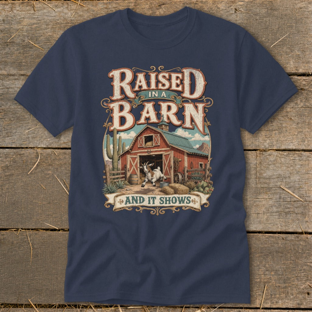 Navy t-shirt with "Raised in a Barn and It Shows" text and a barn scene.