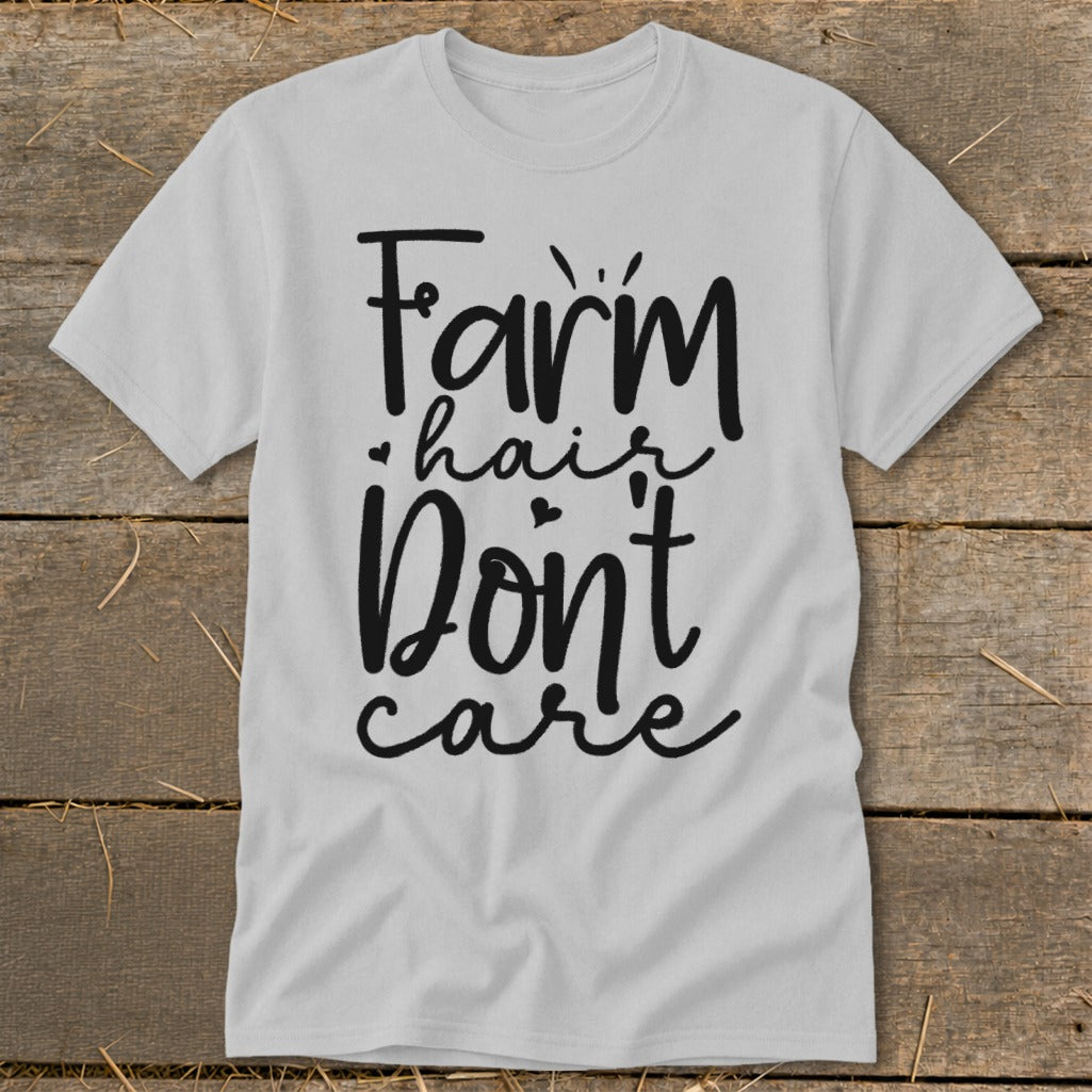 White t-shirt with black text "Farm hair don't care".
