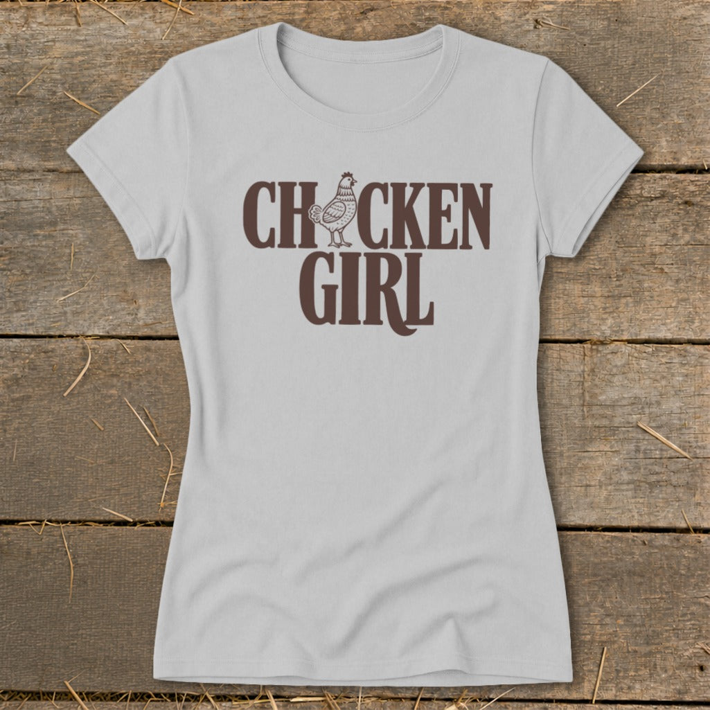 Light grey t-shirt with brown "CHICKEN GIRL" text and chicken graphic.