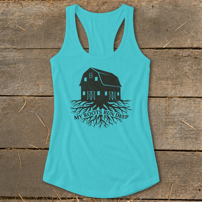 Turquoise tank top with a black barn and roots graphic, text reads "MY ROOTS RUN DEEP".