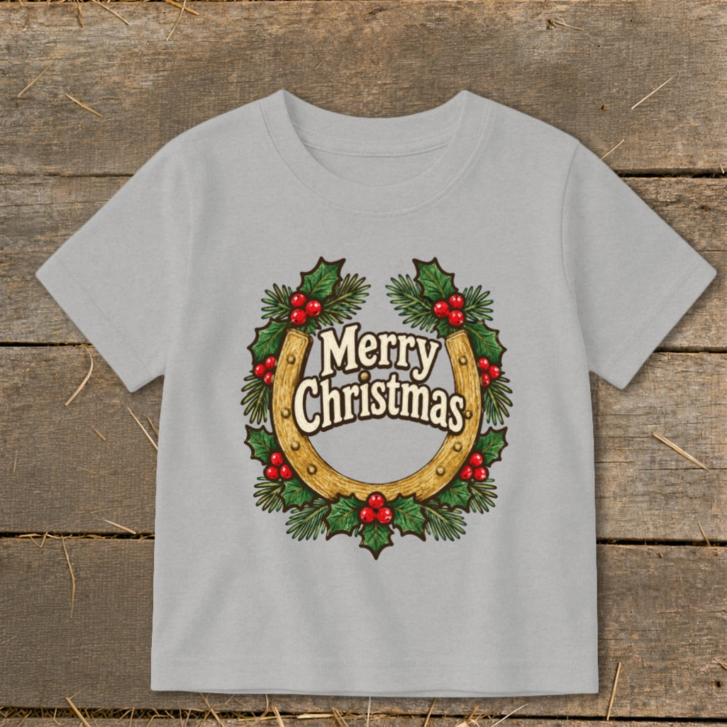 Gray t-shirt with a horseshoe wreath graphic saying "Merry Christmas".