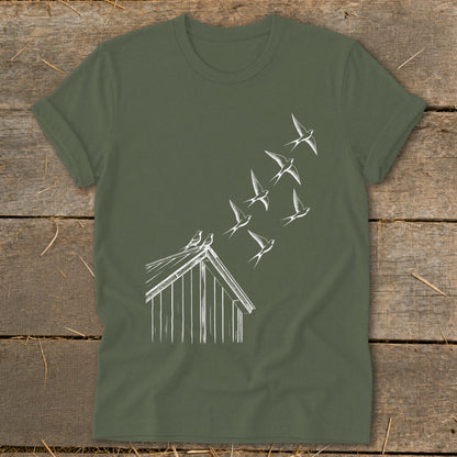 Olive green t-shirt featuring a white line drawing of a flock of swallows flying from a rooftop.